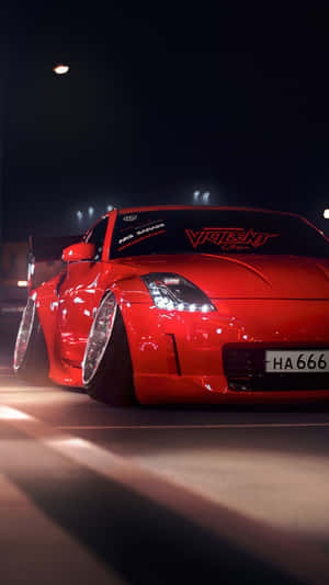 Zoom Around The Town In Style With The Nissan 350z Wallpaper